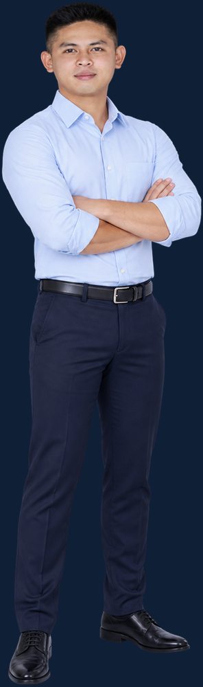 Diether Valeroso standing with arms crossed in a light blue shirt